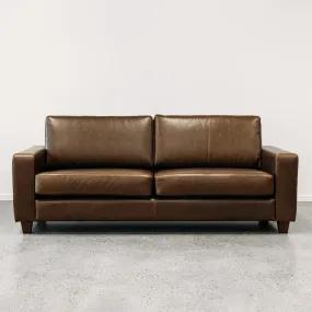 Coco leather sofa in greenstone monarch