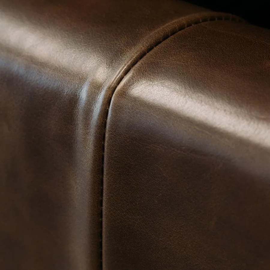 Coco leather sofa in greenstone monarch